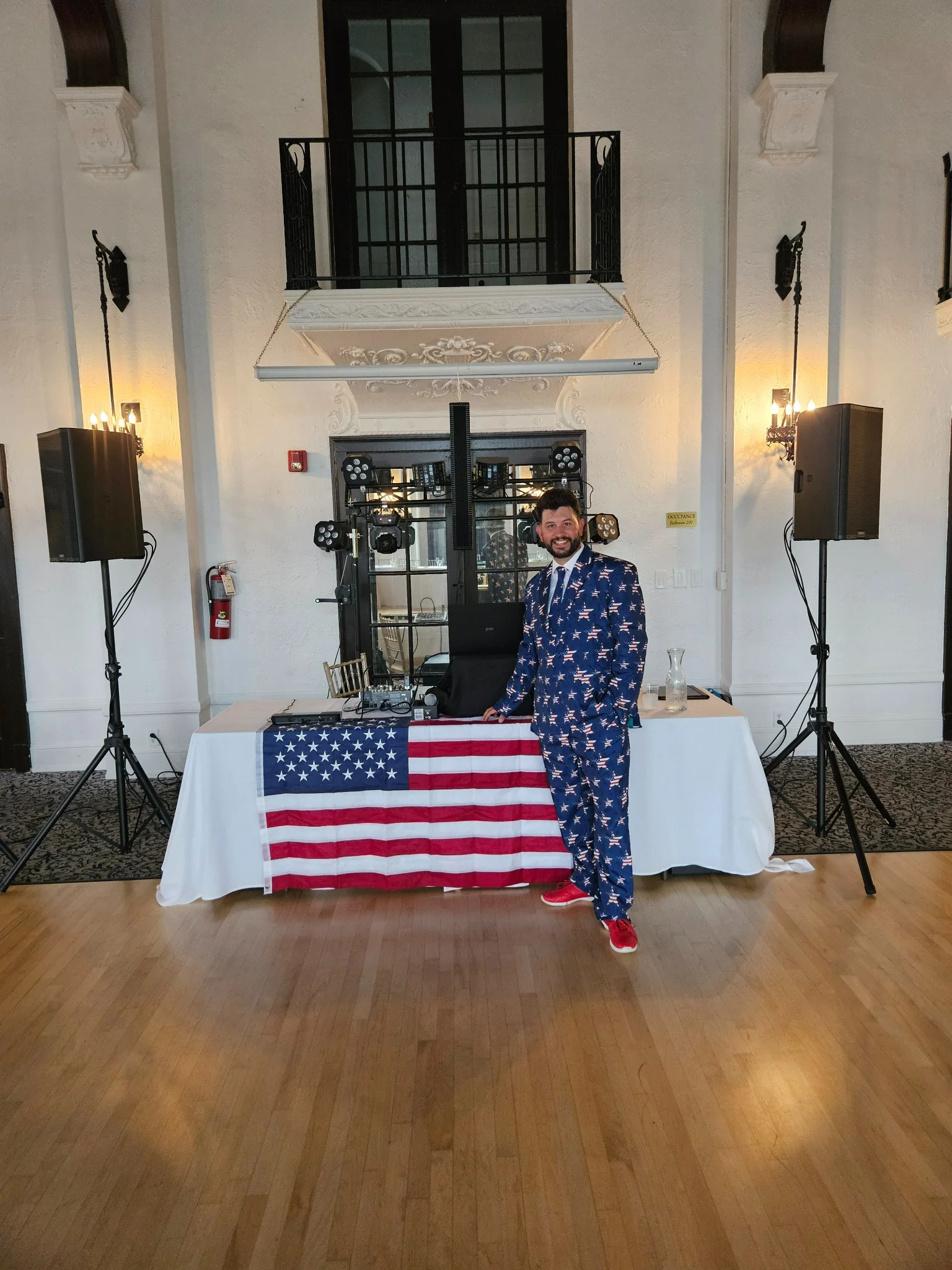 PJE Entertainment DJ setup at an elegant indoor venue